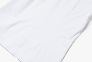 白いスビンコットンのラウンドカラーシャツ